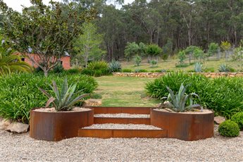 Raised Garden Beds - 560mm Flex in weathered steel to create circular planters
Raised Garden Beds - 150mm Rigid in weathered steel to create steps