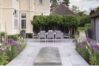 Garden Design and Build by Cube 1994, luxury courtyard garden with bespoke decorative water-feature 