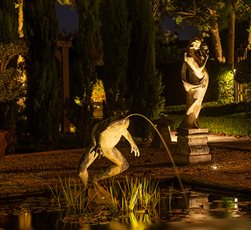 Garden lighting design and installation by Mark Packham, Garden and Landscape Lighting Designer at Garden Spark 
Country house large pond and statue gently illuminated at night