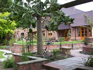 Rear garden and reclaimed stone pergola