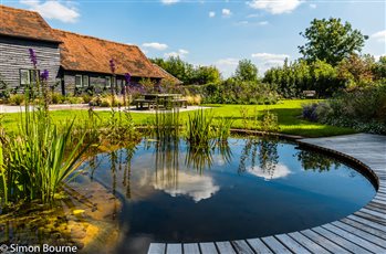 Wildlife scheme to encourage a large range of biodiversity.  Within a few months there were increased pollinators and the pond now has rare newts!