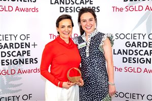 SGLD Awards 2026 Large Residential Landscapes & Gardens winner Miria Harris MSGLD with sponsor Stoneworld