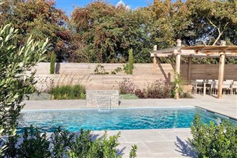 Bespoke pergola and slatted panels for Paul Baines