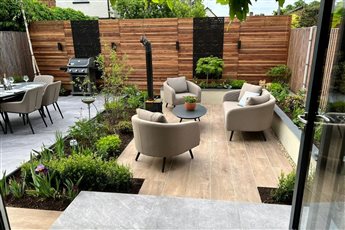 Contemporary Multi-Level Garden designed by Mistletoe Garden Design
Products used: Kebur Valley Grey Porcelain Paving, Pro Willow Light Brown Porcelain Paving, Western Red Cedar Slatted Fencing and Battens