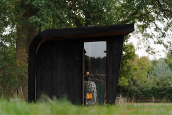 Side view of an Aire+ Outdoor Sauna