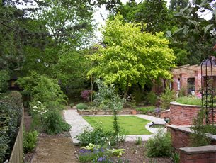 Rear garden with path through to Japanese stroll garden