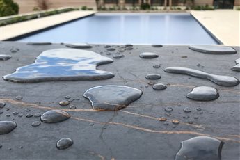 Brighton seafront garden design, pool coping and cover.