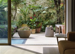urban courtyard garden with alpine bowls