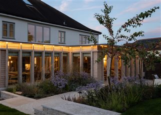 contemporary garden with evening lights