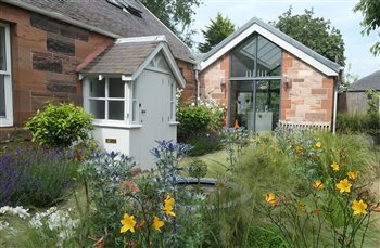 Country cottage charm on the Scottish coast. This East Lothian garden is full of colour, texture and seasonal interest.