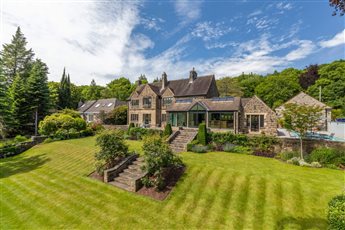 Large country home and garden. Planting design. 