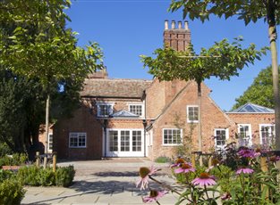 Rectory Garden Buckden

Aged Limestone and red brick terraces with formal trees and perennial planting