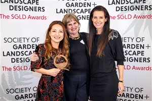 SGLD Awards 2026 Built Landscape Design winner Charlotte Rowe Garden Design, Principal Designer Tomoko Kawauchi MSGLD with sponsor Grad Decking System