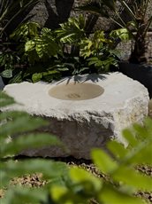 Stone Boulder Bird Bath carved from Purbeck Stone.