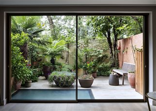 window view of tiny urban courtyard