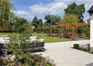 Large family garden with large bespoke pergola for entertaining