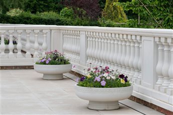 Haddonstone Romanesque Planters and bespoke Balustrade