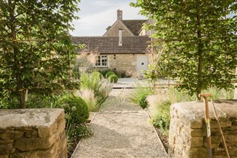 Wiltshire Country Garden. Informal naturalistic planting with formal elements.