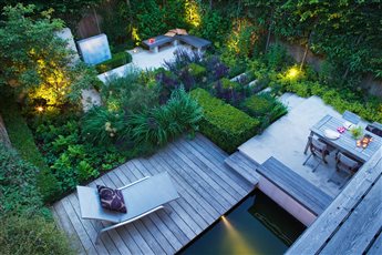 A birds eye view of this garden in London shows the importance of layout, design, good lighting and generous planting.