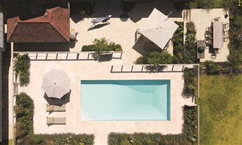 Terraces accompanied by themed planting creates three distinct areas.