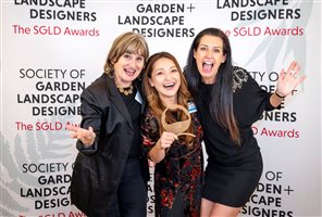 SGLD Awards 2026 Built Landscape Design winner Charlotte Rowe Garden Design, Principal Designer Tomoko Kawauchi MSGLD with sponsor Grad Decking System