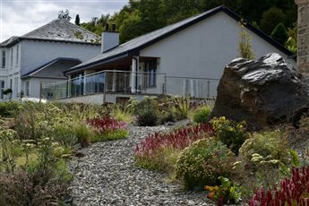 Coastal garden in Tighnabruaich that links the house and garden to the wider natural landscape. Won Small Project Big Impact award for planting design in 2020. Photo credit: Rachel Bailey