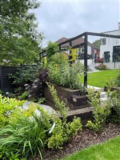 1.  A recent project for new home owners with a steeply sloping garden developed on four levels.