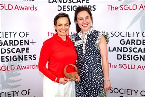 SGLD Awards 2026 Large Residential Landscapes & Gardens winner Miria Harris MSGLD with sponsor Stoneworld