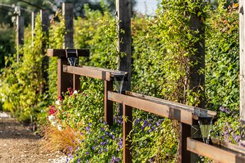 Semi-formal country garden - a quirky use of materials create an elevated water feature that is loved by the clients and birds alike.