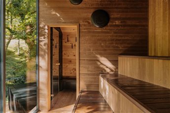 Inside an Arden Outdoor Sauna, looking into the changing area