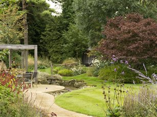 Surrey Garden with Drystone pizza oven