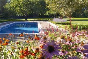 Rectory Garden Buckden

Aged Limestone and red brick terraces with formal trees and perennial planting