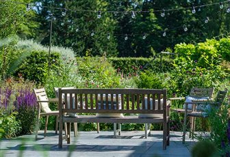 Garden terrace detail, Welsh slate with rich planting.