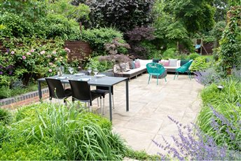 The Clients wanted a garden which surrounded them in lush, romantic planting, for it to feel as though it had always existed.  They wanted the garden to have two distinct zones: a relaxation area for the adults and play area for the children.