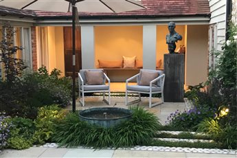 Courtyard garden design, evening lighting, Plumpton, East Sussex