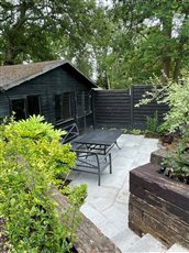 8.  Secluded dining area beside cabin.