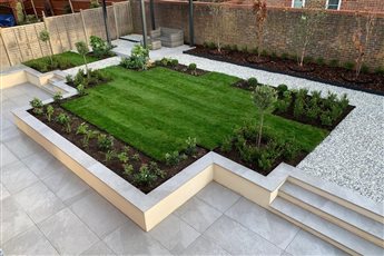 Contemporary Garden Transformation designed by Mistletoe Garden Design
Products used: Kebur Contempo Sierra Grey Porcelain Paving, Polar Ice Chippings, Metal Edging
