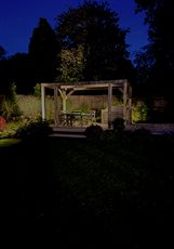 Garden Design by Anna Helps based in Sussex 
Garden lighting design and installation by Mark Packham, Garden and Landscape Lighting Designer at Garden Spark 
Pergola and seating area gently illuminated 