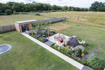 Garden Design and Build by Cube 1994, bespoke garden room with lounge and entertaining areas