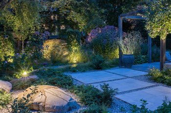 Large Glacial boulder core drilled as a water feature with bowl carved out