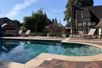 Mediterranean-Inspired Pool Garden by TAW Garden Landscapes and Mistletoe Garden Design
Products used: Kebur Sinai Pearl Tumbled & Etched Egyptian Limestone Paving, Wienerberger Alder Alfaton Clay Pavers, UltraScape Flowpoint Fine Rapid Set Grout