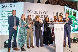 SGLD Awards 2026 Grand Award winner Charlotte Rowe Garden Design, Principal Designer Tomoko Kawauchi MSGLD with sponsor Ca'Pietra