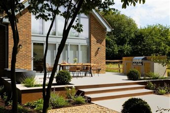 Modern Family Garden by Winslade Landscapes and Raine Garden Design

Products used: Kebur Contempo Pietra Jura Beige Porcelain Paving, 20mm Shingle Gravel, Custom Slatted Wooden Fencing