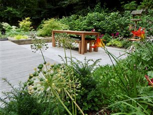 Diagonal shady, deck garden using composite decking