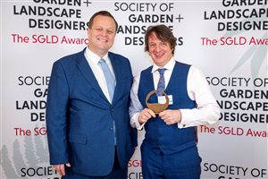 SGLD Awards 2026 Healing or Learning Landscapes & Gardens winner Nicholas Atherton MSGLD with sponsor MFL Insurance Group