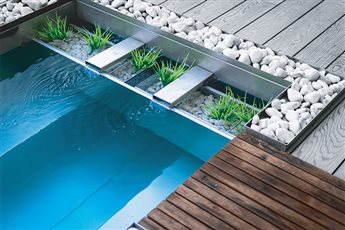 Naturally filtered stainless steel plunge pond