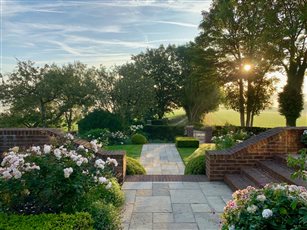 A former drive and car park now is now an inviting front garden creating a sense of arrival to this South Downs garden - winner of the SGD Medium Residential Garden Award 2018